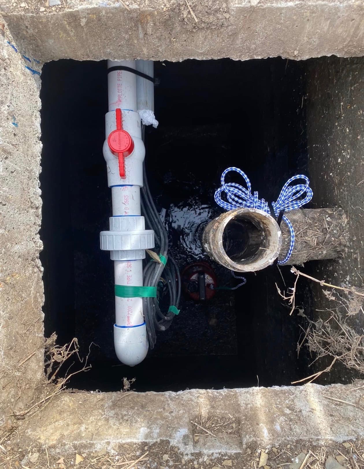 New pump discharge piping with union and shutoff valve in a concrete pit